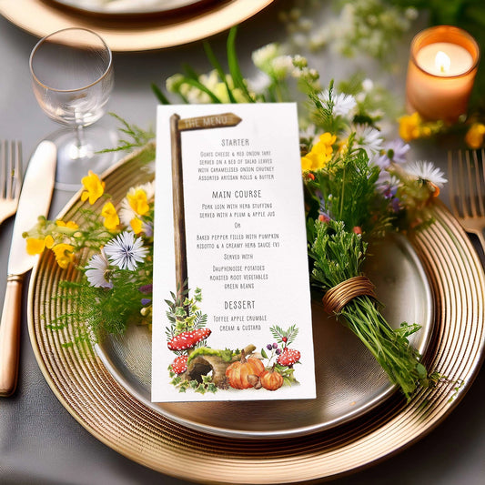 autumn woodland Wedding menu card on a table setting with flowers and candles