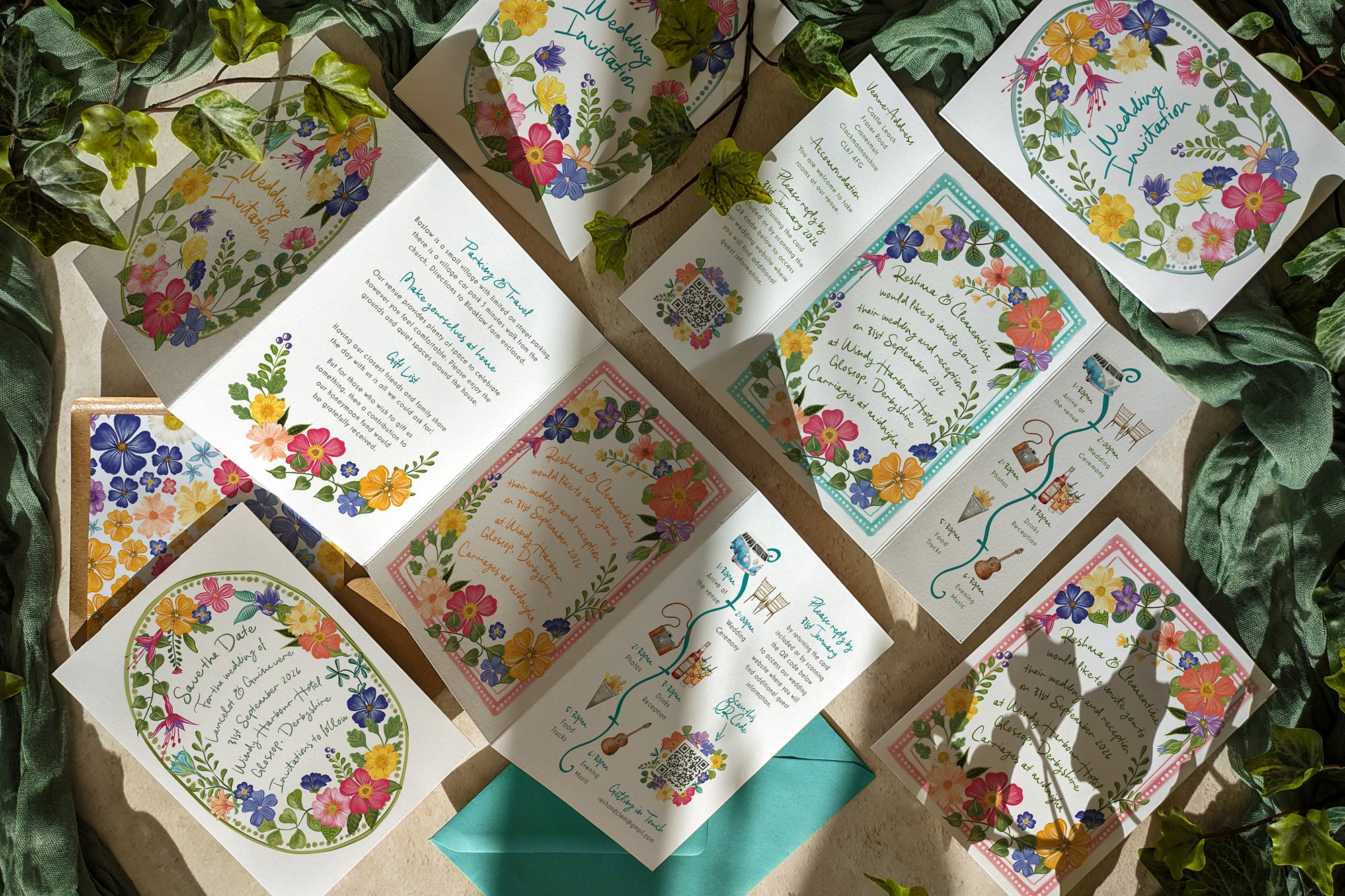 Collection of bright and colourful  floral wedding invitation cards on a leafy background