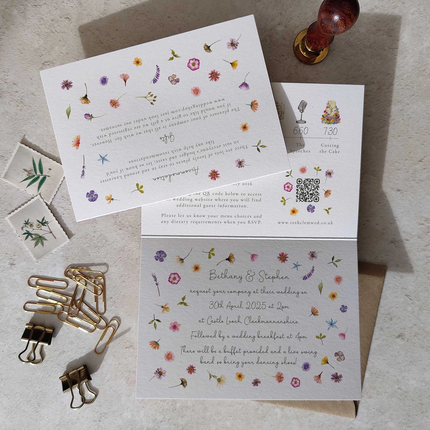 Folded floral wedding invitation with QR code and wedding timeline