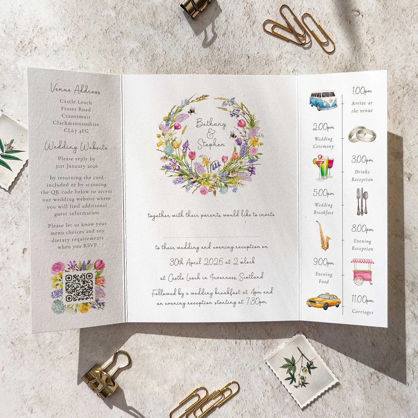 Wedding invitation card with spring floral design and event schedule on a textured surface.