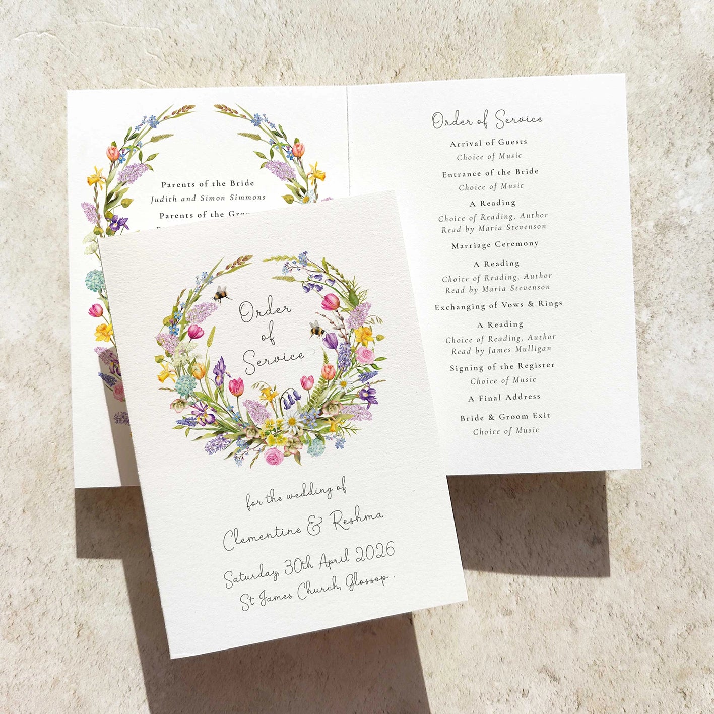 Wedding order of service with floral design on a textured surface