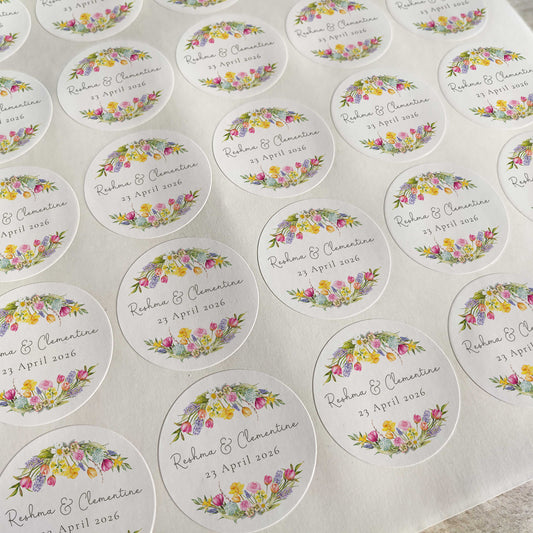 Round wedding stickers with floral designs and text on a white background