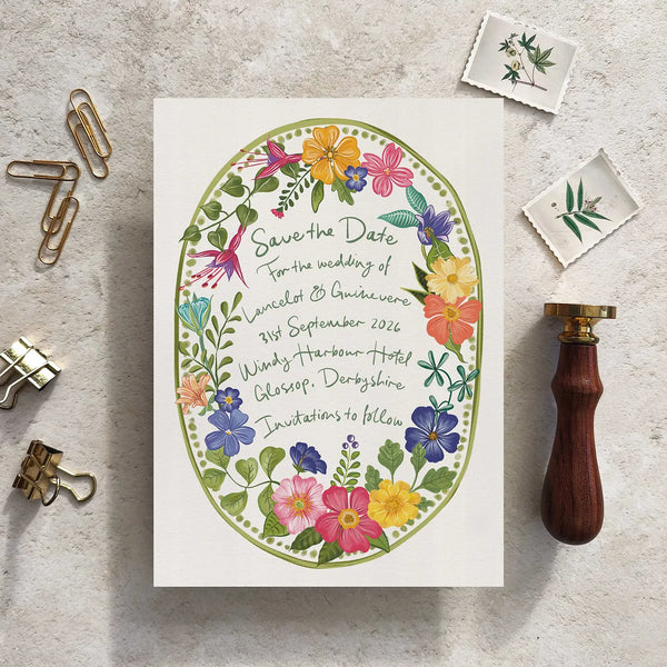 Virant and colourful hand painted flowers feature in this festive wedding stationery collection