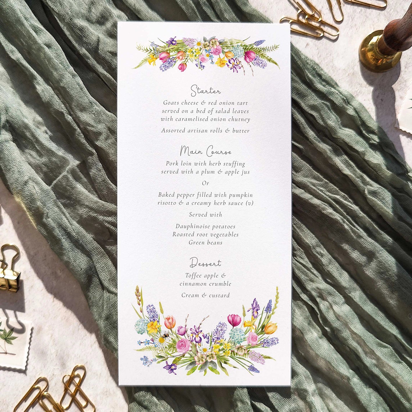 Wedding Menu with spring flowers floral design on a textured fabric background