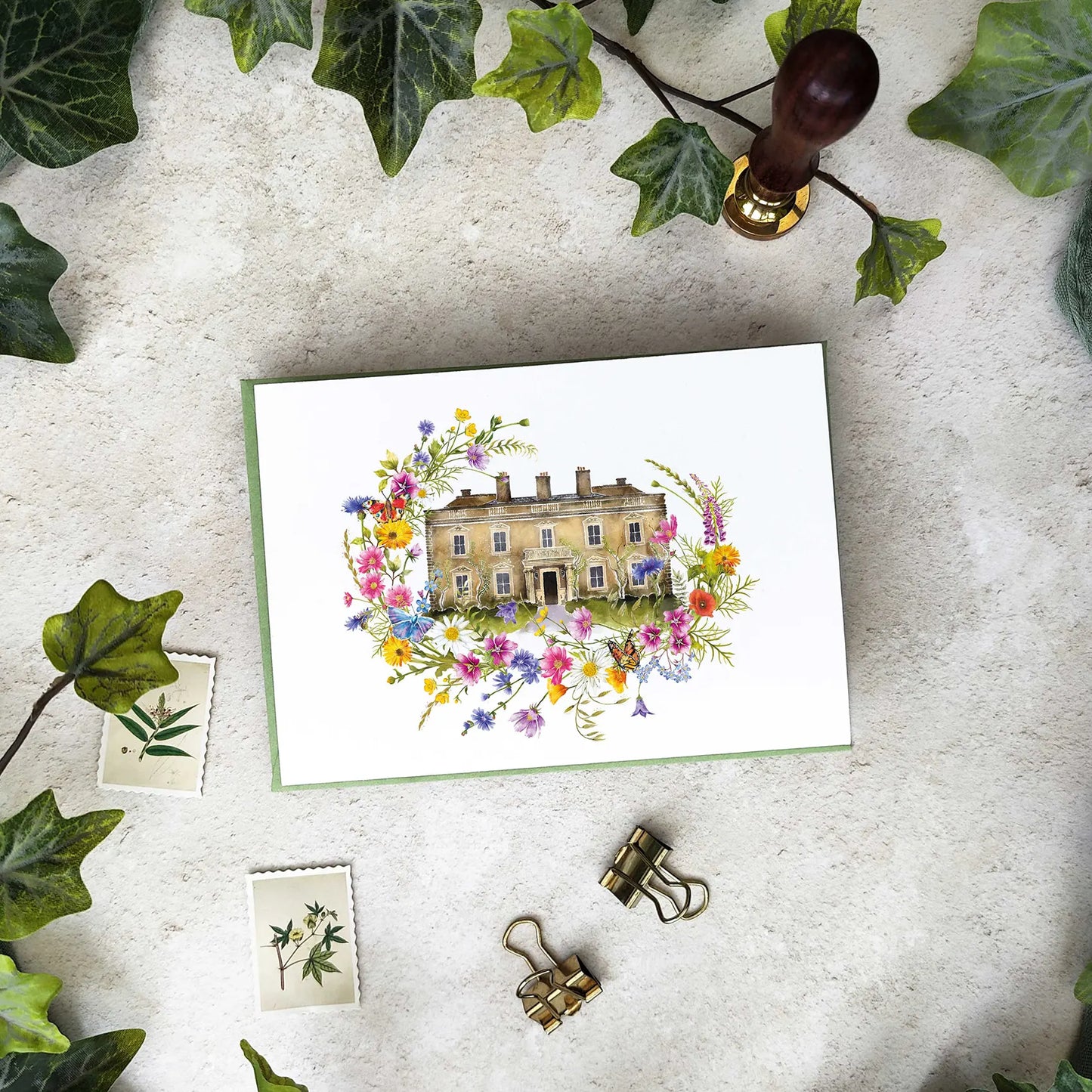Folded wedding invitation with colourful watercolour wildflower paintings and an illustrated wedding timeline and a cut off RSVP card. This design is fully personalised and comes with envelopes. This design can include a bespoke watercolour venue painting which you can order in the Paper Willow shop.
